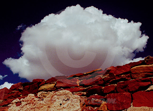 CLOUD RISING ABOVE RUBBLE WALL (Rt 66 Montoya NM)