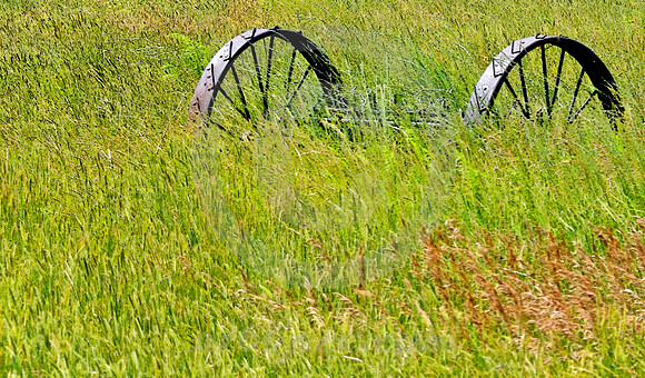 TWO WHEELS IN FIELD (Lincoln Highway Egbert WY)