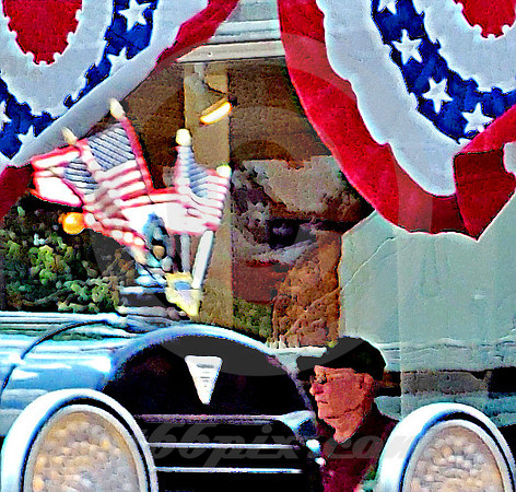 BUNTING, FLAG CLUSTER & MAN (Lincoln Highway Kearney NE)