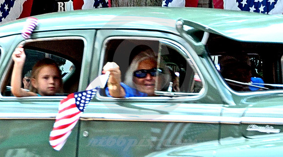 TWO FLAG WAVERS (Lincoln Highway Kearney NE)
