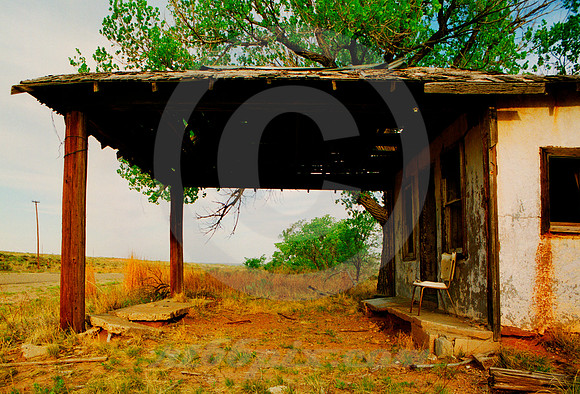 ABANDONED GAS STATION & CHAIR (Rt 66 Glenrio NM)