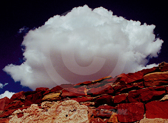 CLOUD RISING ABOVE RUBBLE WALL (Rt 66 Montoya NM)