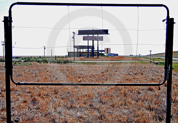 ABANDONED TRUCK STOP THROUGH SIGN FRAME (Rt 66 Landergin TX)