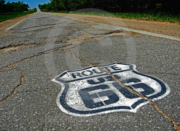 STENCILED 66 SIGN ON SIDEWALK HIGHWAY (Rt 66 nr Narcissa OK)