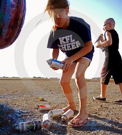 GIRL & BOY WITH SPRAY PAINT (Rt 66 Cadillac Ranch TX)