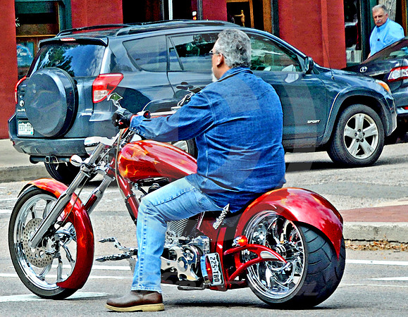 RED BIKE & ADMIRER (Old Colorado City CO)