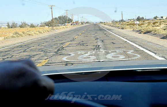 SHIELD ON REPAIRED ASPHALT (Rt 66 nr Ludlow CA)