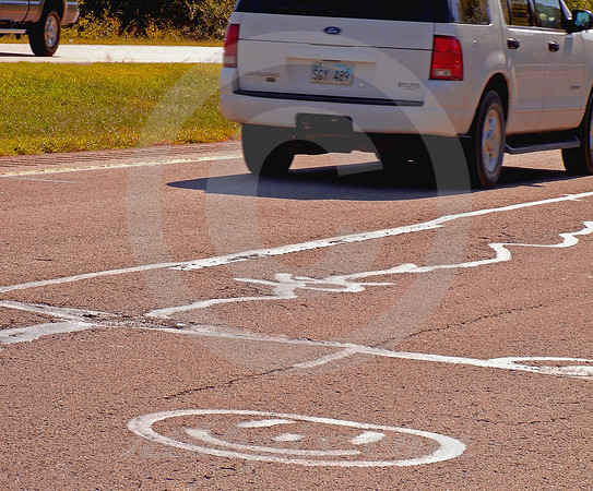 SMILEY TAR-FACE (US 75 nr Henryetta OK)